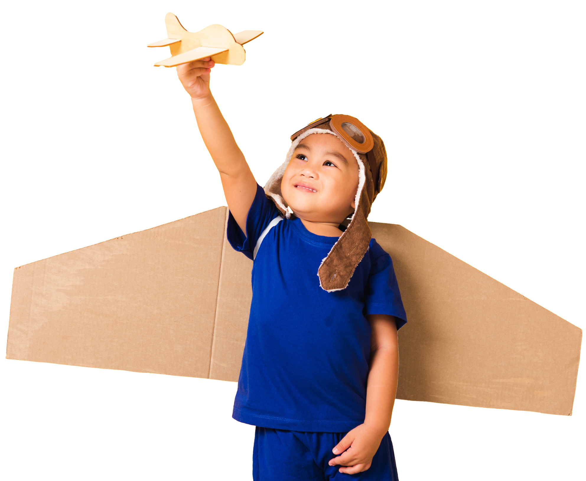Young boy with toy airplane and cardboard wings at Calgary daycare